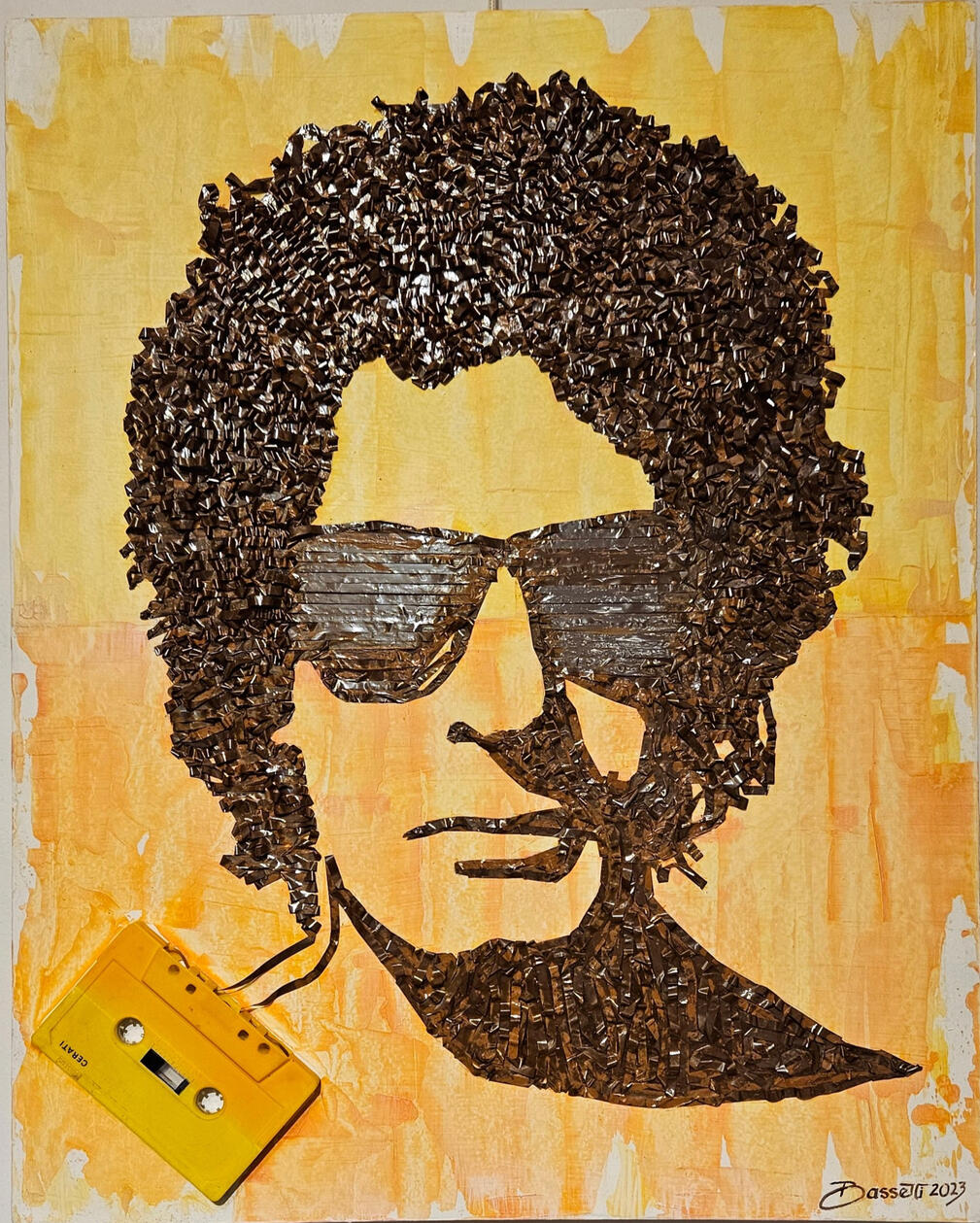 "Amor amarillo". cinta de cassette sobre acrilico. 50 x 40 cm
